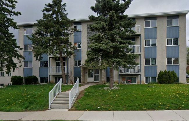 Building Photo - TWO BEDROOM Unit 14