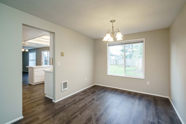 Photo - Recently Updated with Wood Laminate Flooring and Fresh Paint