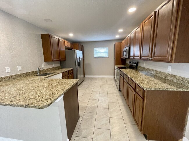 Photo - 4 bedroom 2 bathroom pool home for rent