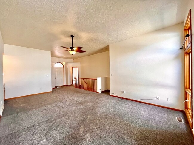 Photo - Spacious 3 bedroom/3 bath Townhome with 2 car Attached Garage and Private Yard in Evans, CO