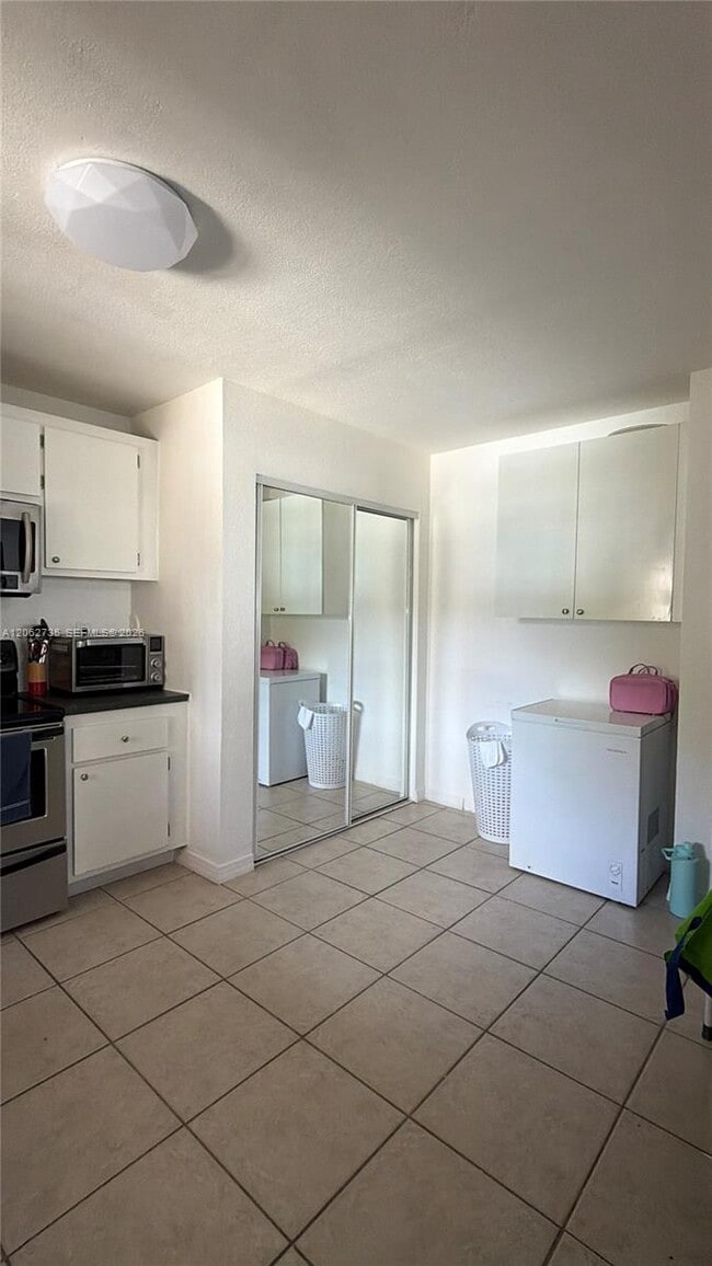 Building Photo - 12193 Royal Palm Blvd Unit 1A