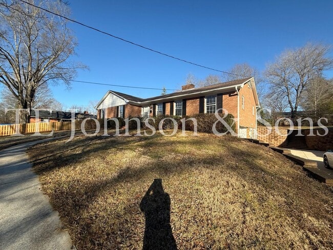 Photo - Spacious 4BR Home with Finished Basement, Screened Porch & Garage in Winston-Salem