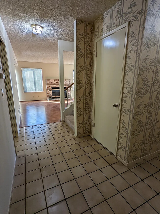 Entry hall and door of guests closet - 1533 N 1st St