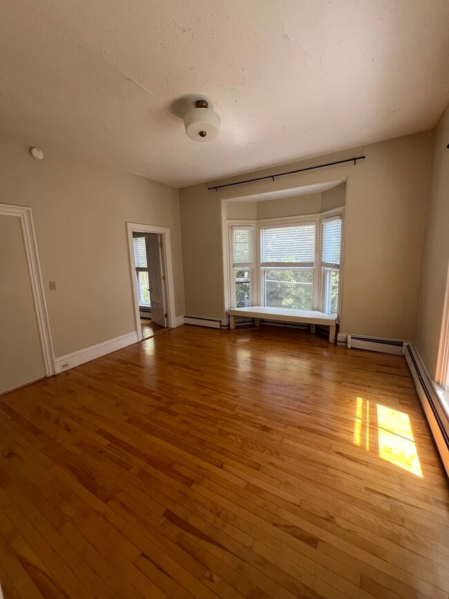 Large bedroom w/ bay window - 130 Emery St Unit Apartment 2