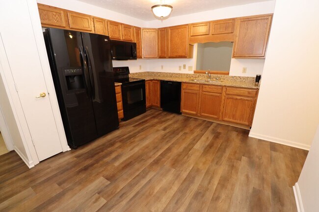 Photo - Discover this well-maintained 3-bedroom, 2-bath home in Indianapolis featuring an attached garage...