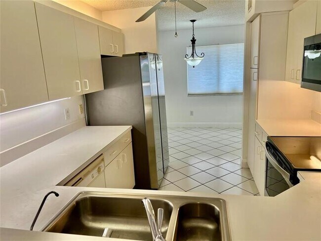 Photo - 9587 Weldon Cir Unit B204