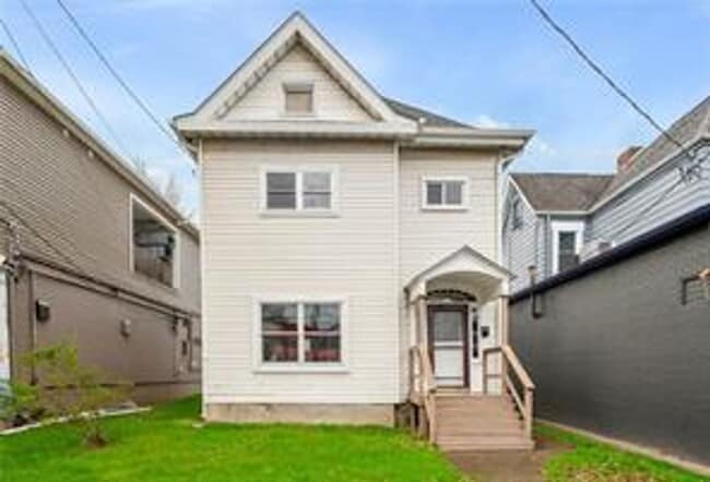 Photo - Charming 2-Bedroom Home with Tall Ceilings & Backyard Deck in Coraopolis