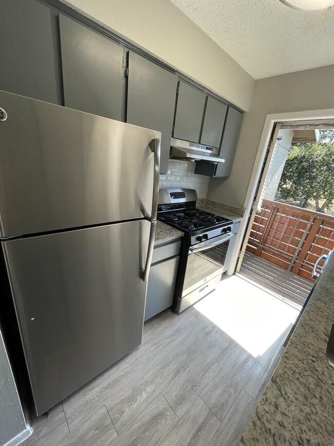 Kitchen leading to 2nd balcony