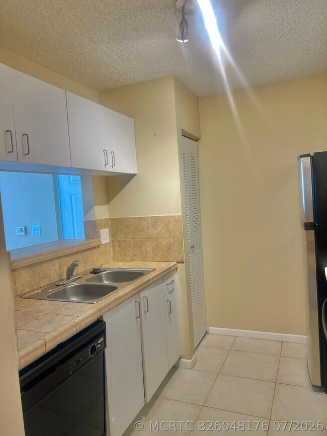 Photo - 1743 Village Blvd Unit 205