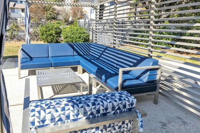 Relax by the pool or enjoy the shaded pavilion area at Eagles West Apartments.