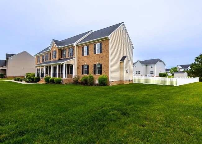 Photo - Huge house with vaulted ceilings and fenced in rear yard
