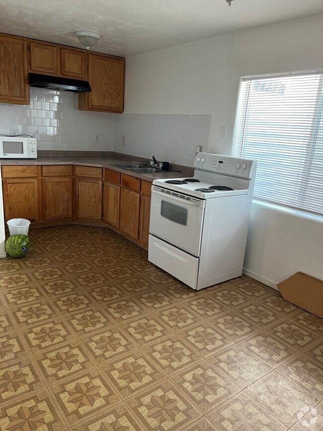 Building Photo - 3139 S Marseilles Way Unit Rose Apartment