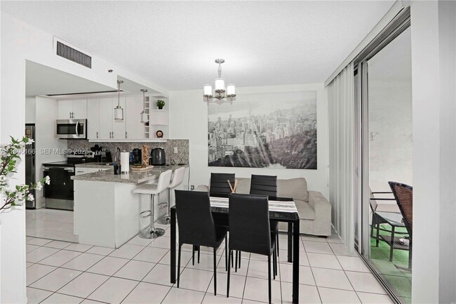 Building Photo - 1700 NW N River Dr Unit 201