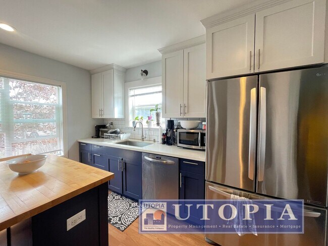 Photo - Beautiful 2Bed/1Ba Home on Large Corner Lot with 2-Car Garage Unit Front House