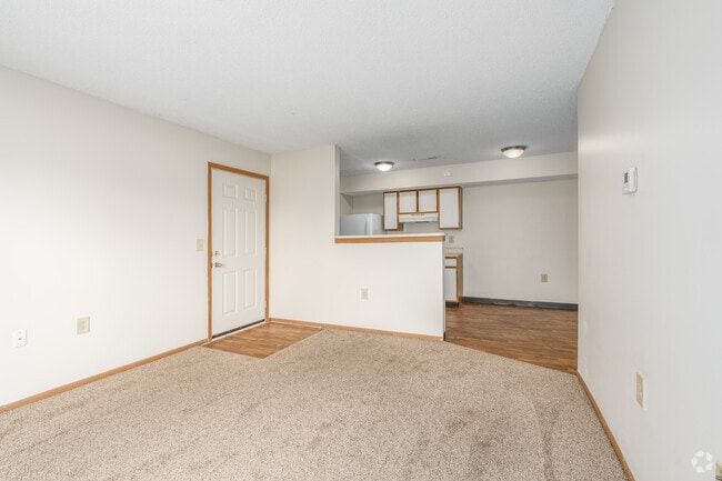 Main living area and kitchen of a River Valley apartment home in Lancaster, OH.
