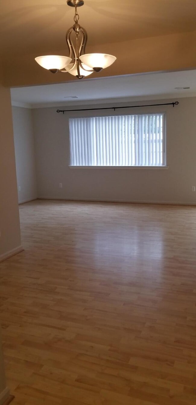 Photo - 2 Bedroom, 1.5 Bath Townhouse w/ Garage & Huge Master Bedroom. Full Sized Washer & Dryer In Unit.