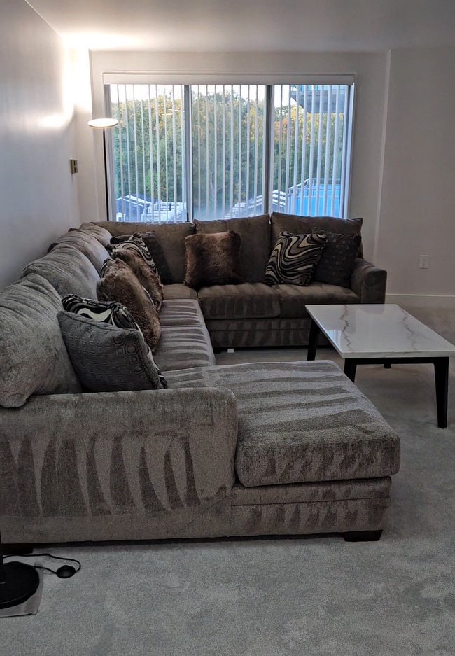 sectional/sleeper couch and coffee table - 10201 Grosvenor Plz Condo Unit 1128