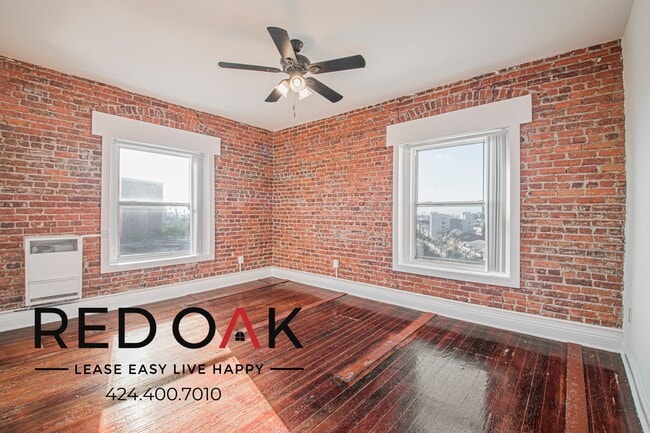 Building Photo - 915 S Carondelet St Unit 402