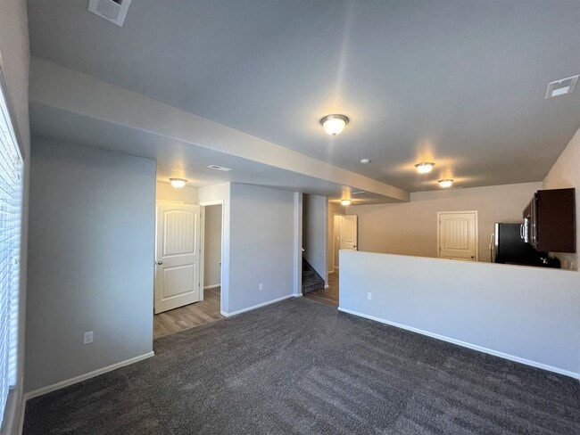 Photo - Townhome w/ 2 car garage, A/C-Newer, Low Maintance, & Conviniently Located