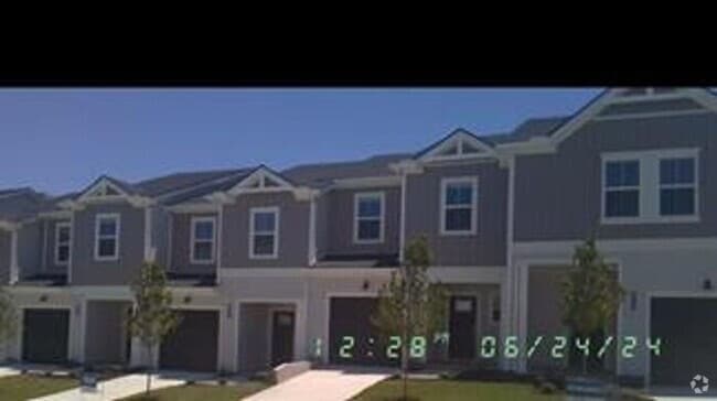 Building Photo - BRAND NEW, energy-efficient condo townhous...