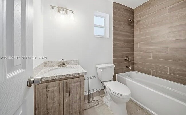 25 NE 210th St