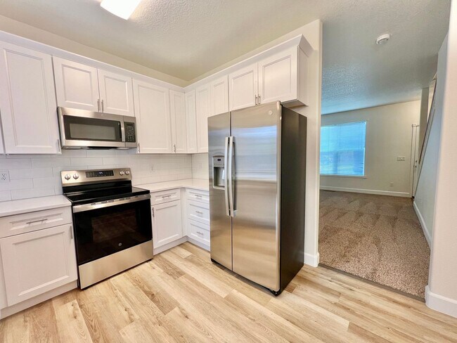Photo - NEWLY RENOVATED! Spacious 2-Bedroom Townhome in a Charming Cul-de-Sac!