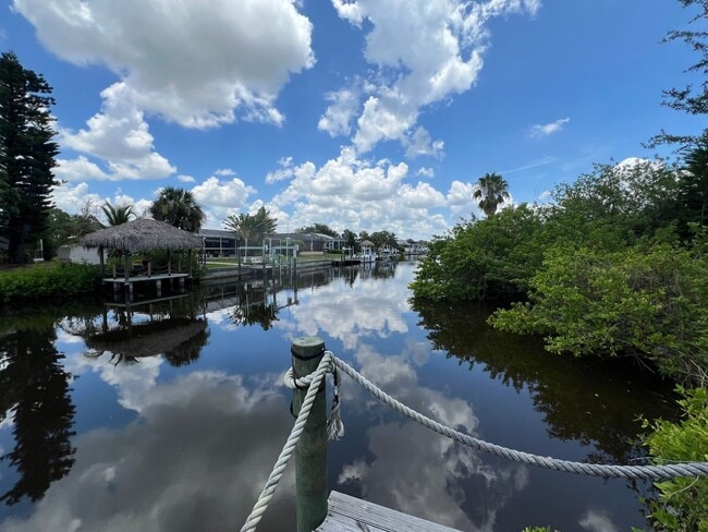 Photo - ANNUAL, UNFURNISHED * POOL * CANAL ** AVAIL 8/1/26 * 3 BEDS/2 BATHS * $2,095/month