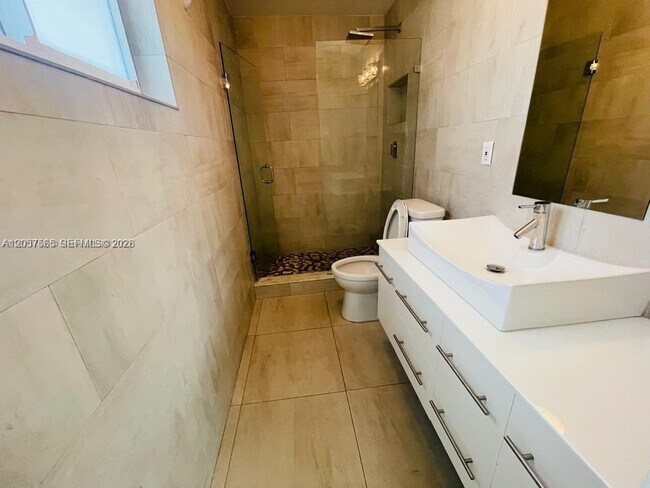 Photo - Northeast 41st Street, Oakland Park, FL 33308 - 3 BR 2 BA house