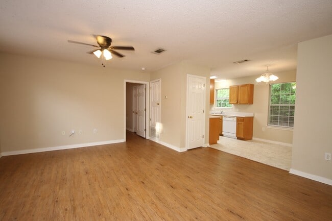 Photo - 3BR/2BA Home Near UWF – Wood-Look Flooring, Galley Kitchen, Pet Friendly!
