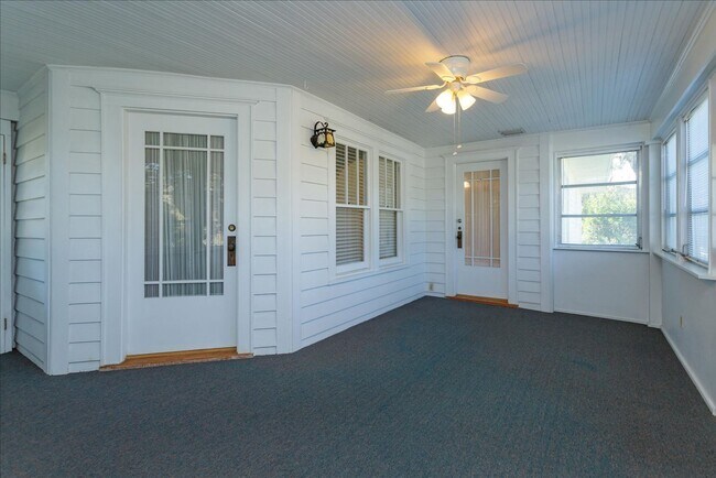 Photo - Run don't walk for this one of a kind beautifully maintained Old Florida Charmer on a park like d...