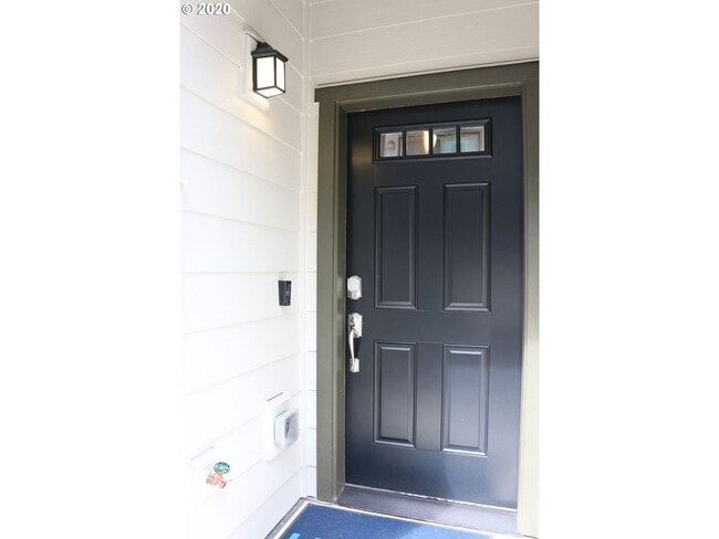 Photo - Modern 3-Bedroom Townhome-Style Home with Attached Garage, Private Patio & En-Suite Bathrooms in ...