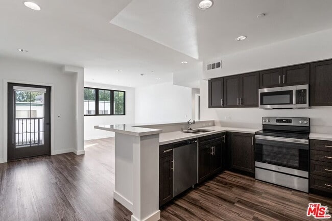 Photo - 5020 Woodman Ave Unit 317