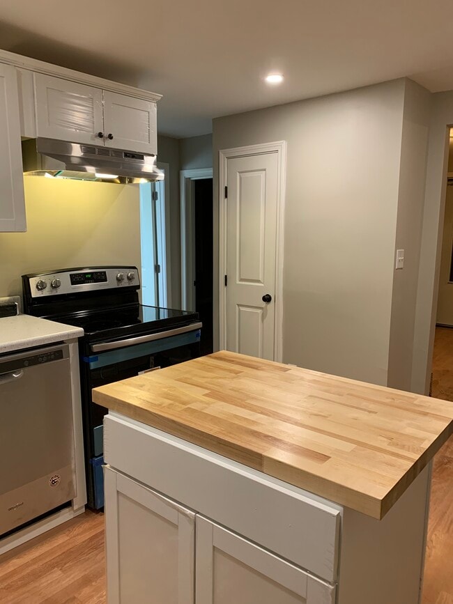 Kitchen with Butcher Block island - 5 Cordage St Unit 1