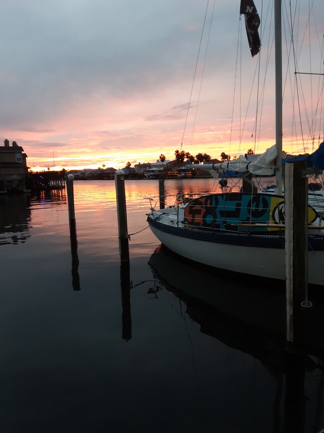 Sunset view on canal - 15421 Seamount Cay Ct Condo Unit Sandy Dollar
