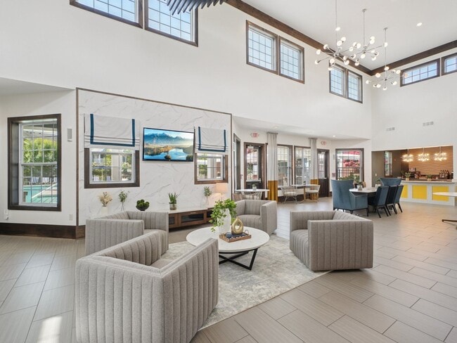 Spacious resident clubhouse and modern community gathering spaces at Village at Broadstone Station in Apex, North Carolina