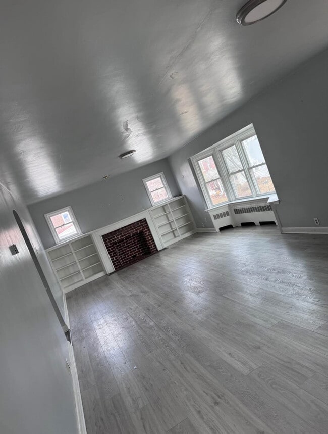 Living Room Area (open floor plan) - 519 N Evans St Apartments Unit Rear