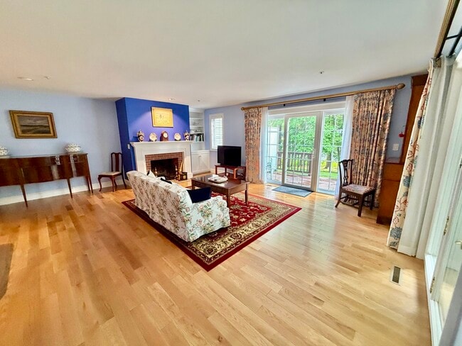 Formal Living with deck and pond views - 67 Peninsula Dr
