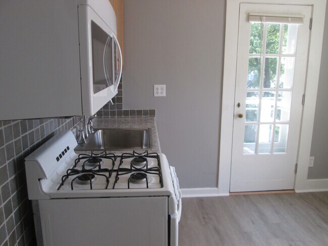 Brand new microwave w/fan & light