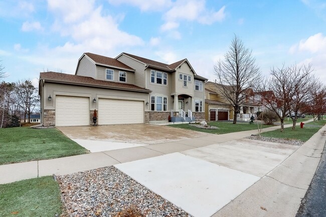 Photo - Grand 5 bed 4.5 bath Maple Grove Home w/ 3-Car Garage! Fully Furnished