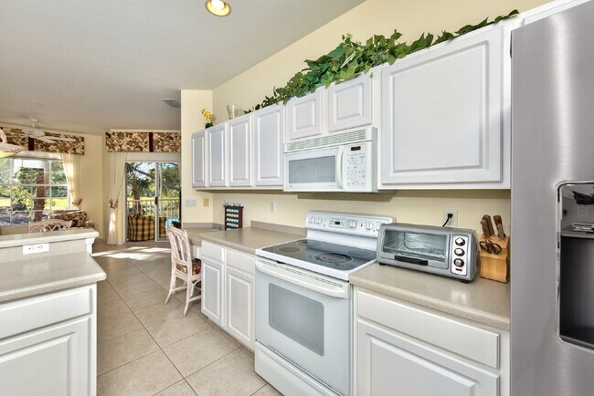 Building Photo - COACH HOME AT PELICAN BAY Unit 810