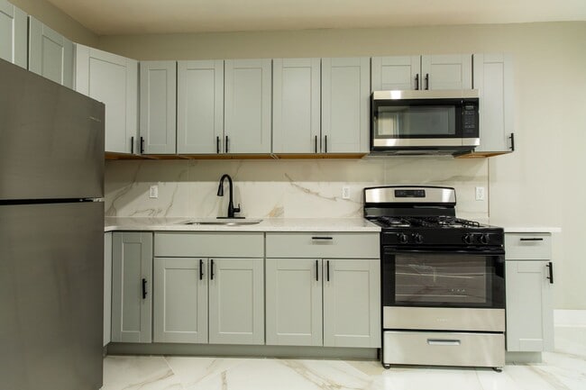 Photo - Spacious 3-Bedroom Single-Family Row Home ...