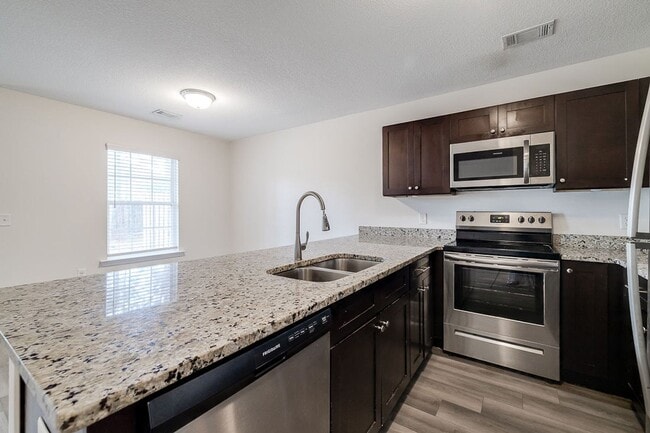 Photo - 3 Bed 2.5 Bath - Spacious Townhome Centrally Located in Rincon