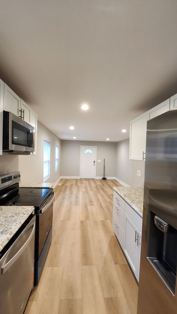 Photo - Renovated 3 bedroom, 2 bath home with a beautiful yard!