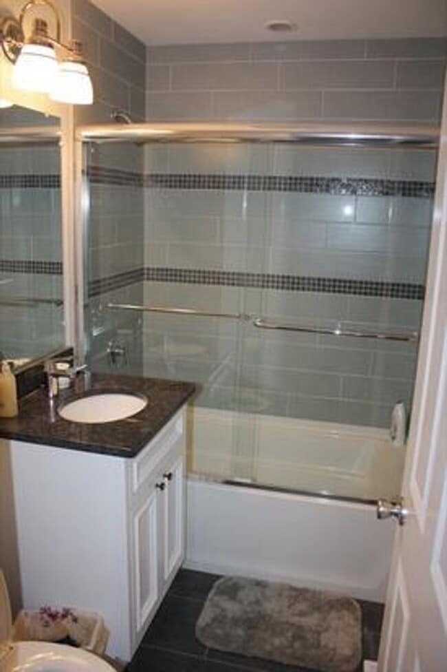 Photo - Renovated 5-Bedroom in Mission Hill | Central Air | In-Unit Laundry | 9/1