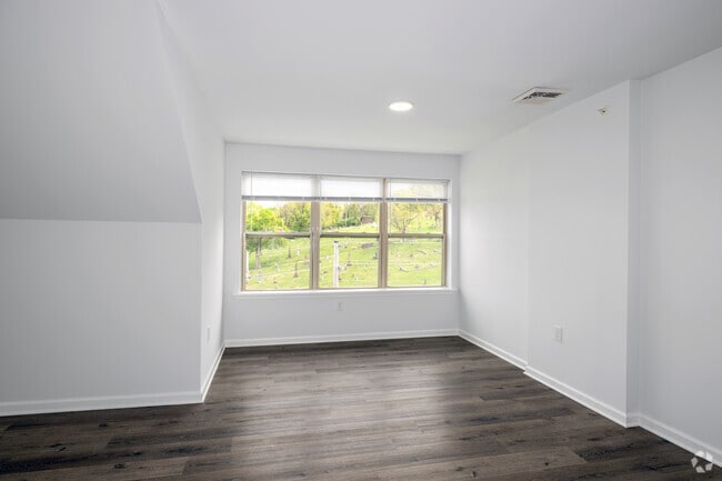 2BR, 1BA - 928SF - Living Room - City Views Apartments
