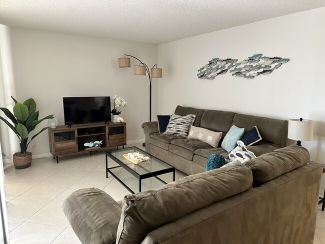 Living Area with Coastal Decor - 500 Egret Cir Condo