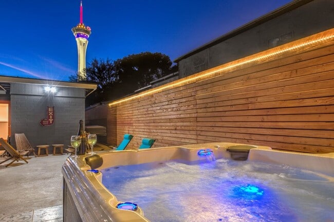 Photo - Vibrant, fully-furnished home near downtown with modern updates, pool & spa with flexible stay op...
