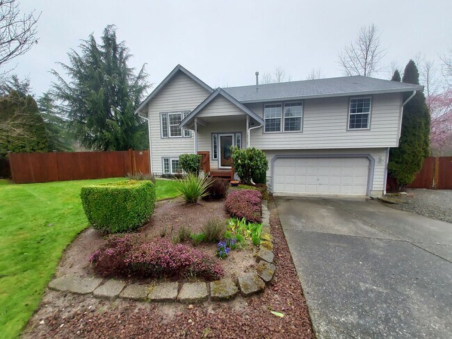 Photo - 4 bedroom 2.75 bath, Huge Fenced Yard with Landscaping Included!!