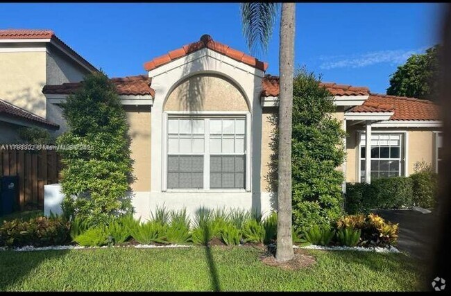 Building Photo - 5596 NW 102nd Ct Rental
