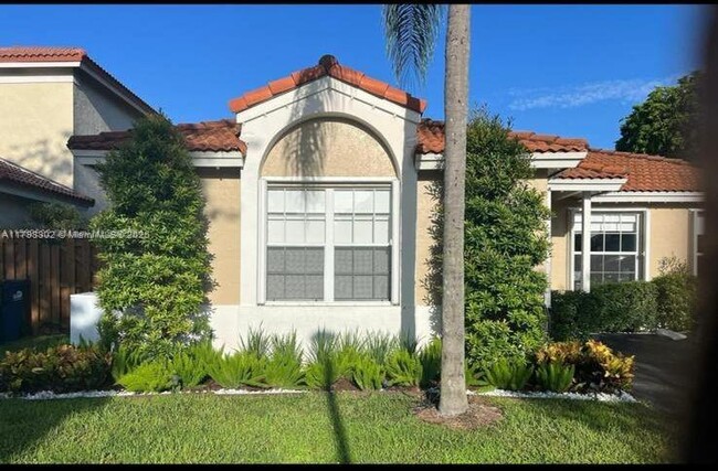 Photo - 5596 NW 102nd Ct Casa